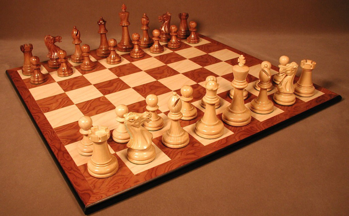 Laughing Knight Sheesham & Boxwood Chessmen on Hazelnut & Maple Chessboard.
